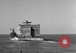 Image of concrete barge Portsmouth England United Kingdom, 1944, second 26 stock footage video 65675048316