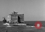 Image of concrete barge Portsmouth England United Kingdom, 1944, second 27 stock footage video 65675048316