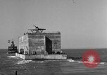 Image of concrete barge Portsmouth England United Kingdom, 1944, second 28 stock footage video 65675048316