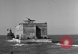 Image of concrete barge Portsmouth England United Kingdom, 1944, second 29 stock footage video 65675048316