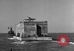 Image of concrete barge Portsmouth England United Kingdom, 1944, second 30 stock footage video 65675048316