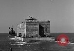 Image of concrete barge Portsmouth England United Kingdom, 1944, second 31 stock footage video 65675048316