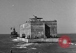 Image of concrete barge Portsmouth England United Kingdom, 1944, second 33 stock footage video 65675048316