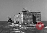 Image of concrete barge Portsmouth England United Kingdom, 1944, second 36 stock footage video 65675048316