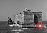 Image of concrete barge Portsmouth England United Kingdom, 1944, second 37 stock footage video 65675048316