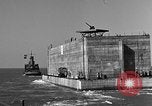 Image of concrete barge Portsmouth England United Kingdom, 1944, second 40 stock footage video 65675048316