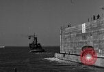 Image of concrete barge Portsmouth England United Kingdom, 1944, second 43 stock footage video 65675048316