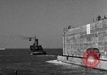 Image of concrete barge Portsmouth England United Kingdom, 1944, second 44 stock footage video 65675048316