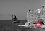Image of concrete barge Portsmouth England United Kingdom, 1944, second 46 stock footage video 65675048316