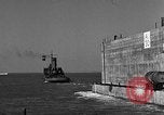 Image of concrete barge Portsmouth England United Kingdom, 1944, second 48 stock footage video 65675048316