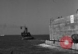 Image of concrete barge Portsmouth England United Kingdom, 1944, second 49 stock footage video 65675048316