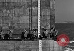 Image of concrete barge Portsmouth England United Kingdom, 1944, second 51 stock footage video 65675048316