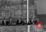 Image of concrete barge Portsmouth England United Kingdom, 1944, second 52 stock footage video 65675048316