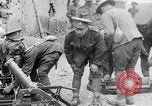 Image of British soldiers with captured German artillery La Boiselle France, 1916, second 39 stock footage video 65675048381