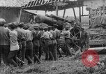 Image of British soldiers setup an 8-inch howitzer France, 1916, second 49 stock footage video 65675048385