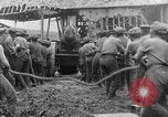 Image of British soldiers setup an 8-inch howitzer France, 1916, second 51 stock footage video 65675048385