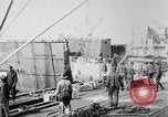 Image of Allied military equipment unloaded from the Arakan Bordeaux France, 1918, second 1 stock footage video 65675048399