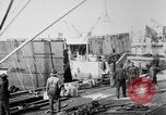 Image of Allied military equipment unloaded from the Arakan Bordeaux France, 1918, second 3 stock footage video 65675048399