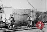 Image of Allied military equipment unloaded from the Arakan Bordeaux France, 1918, second 42 stock footage video 65675048399