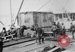 Image of Allied military equipment unloaded from the Arakan Bordeaux France, 1918, second 56 stock footage video 65675048399
