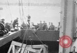 Image of a crane unloading military equipment Bordeaux France, 1918, second 1 stock footage video 65675048400