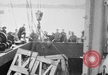 Image of a crane unloading military equipment Bordeaux France, 1918, second 4 stock footage video 65675048400