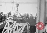 Image of a crane unloading military equipment Bordeaux France, 1918, second 5 stock footage video 65675048400