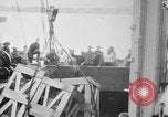 Image of a crane unloading military equipment Bordeaux France, 1918, second 7 stock footage video 65675048400