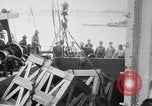 Image of a crane unloading military equipment Bordeaux France, 1918, second 13 stock footage video 65675048400
