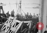 Image of a crane unloading military equipment Bordeaux France, 1918, second 14 stock footage video 65675048400