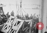 Image of a crane unloading military equipment Bordeaux France, 1918, second 15 stock footage video 65675048400