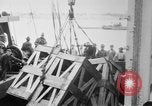 Image of a crane unloading military equipment Bordeaux France, 1918, second 16 stock footage video 65675048400