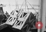 Image of a crane unloading military equipment Bordeaux France, 1918, second 21 stock footage video 65675048400