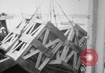 Image of a crane unloading military equipment Bordeaux France, 1918, second 24 stock footage video 65675048400
