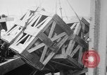 Image of a crane unloading military equipment Bordeaux France, 1918, second 26 stock footage video 65675048400