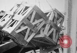 Image of a crane unloading military equipment Bordeaux France, 1918, second 27 stock footage video 65675048400