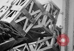 Image of a crane unloading military equipment Bordeaux France, 1918, second 29 stock footage video 65675048400