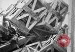 Image of a crane unloading military equipment Bordeaux France, 1918, second 31 stock footage video 65675048400