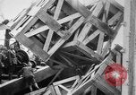 Image of a crane unloading military equipment Bordeaux France, 1918, second 32 stock footage video 65675048400