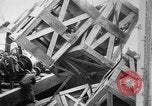 Image of a crane unloading military equipment Bordeaux France, 1918, second 33 stock footage video 65675048400