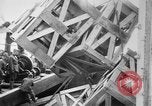 Image of a crane unloading military equipment Bordeaux France, 1918, second 34 stock footage video 65675048400