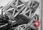 Image of a crane unloading military equipment Bordeaux France, 1918, second 35 stock footage video 65675048400