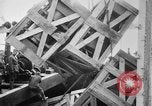 Image of a crane unloading military equipment Bordeaux France, 1918, second 36 stock footage video 65675048400