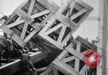 Image of a crane unloading military equipment Bordeaux France, 1918, second 37 stock footage video 65675048400