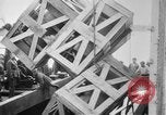 Image of a crane unloading military equipment Bordeaux France, 1918, second 39 stock footage video 65675048400