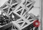 Image of a crane unloading military equipment Bordeaux France, 1918, second 42 stock footage video 65675048400