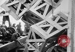 Image of a crane unloading military equipment Bordeaux France, 1918, second 44 stock footage video 65675048400