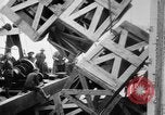 Image of a crane unloading military equipment Bordeaux France, 1918, second 45 stock footage video 65675048400