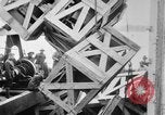 Image of a crane unloading military equipment Bordeaux France, 1918, second 46 stock footage video 65675048400
