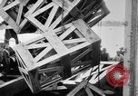 Image of a crane unloading military equipment Bordeaux France, 1918, second 48 stock footage video 65675048400